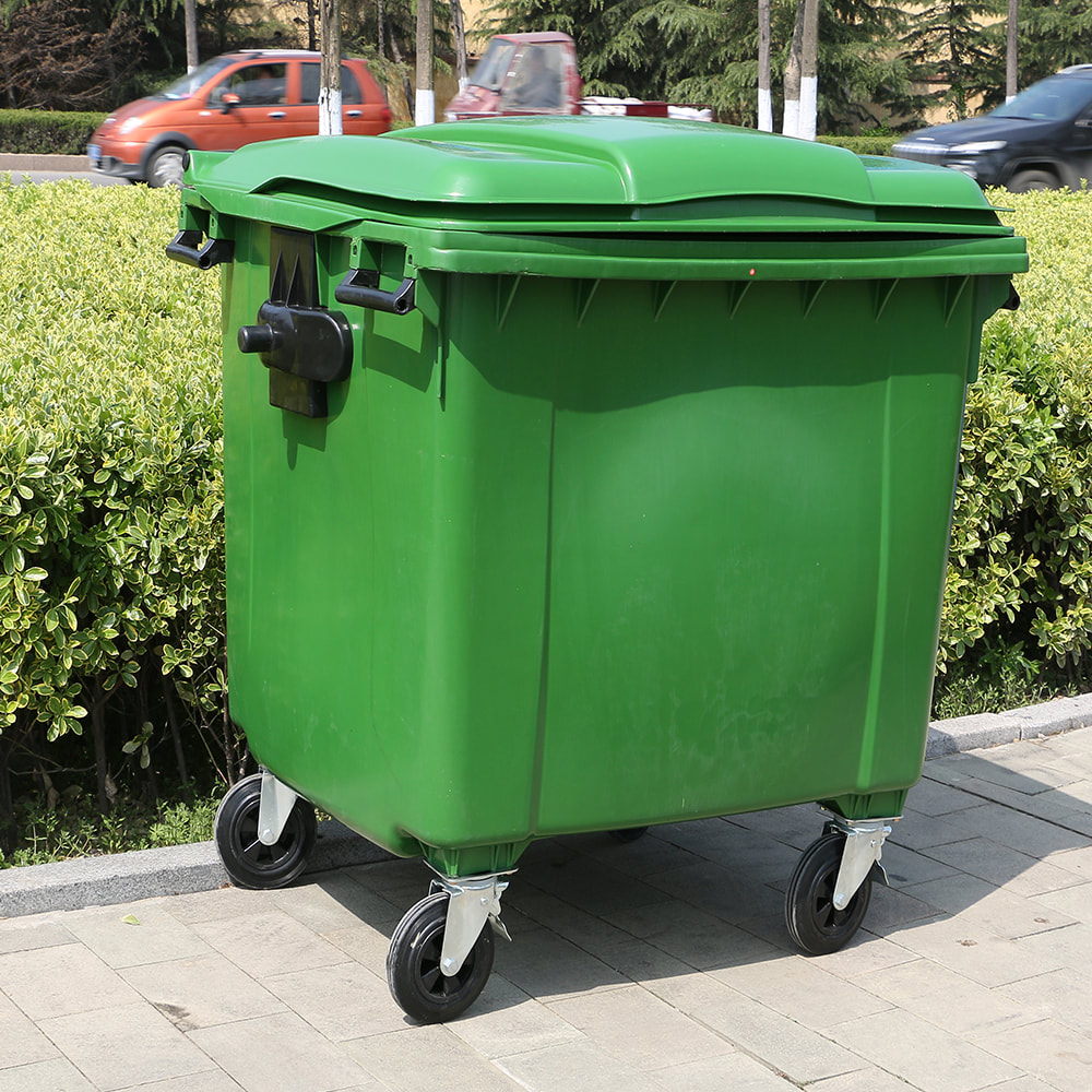 Klassisk grøn affaldscontainer